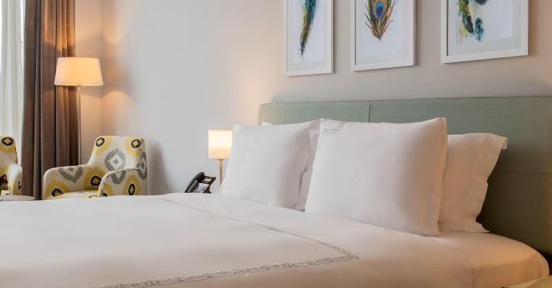Crystal Inn Hotel - Alamein (Adults Only) 阿莱曼 外观 照片 A bed with two pillows